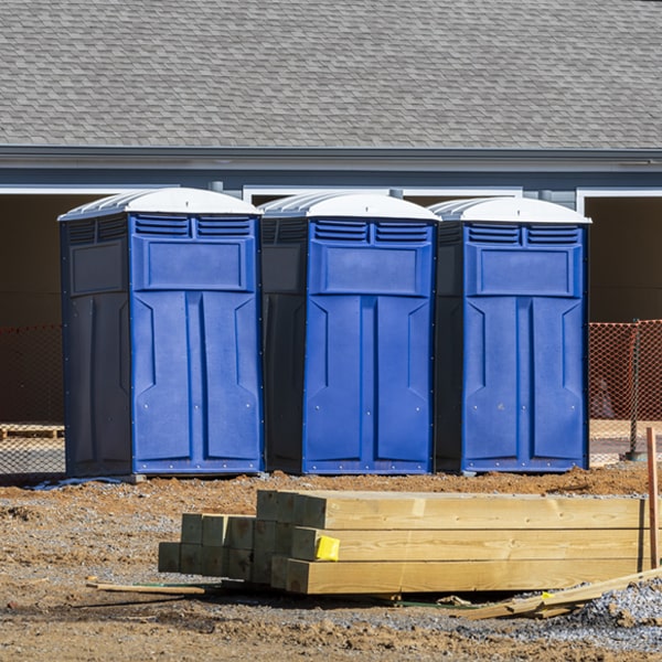 what is the cost difference between standard and deluxe porta potty rentals in Froid